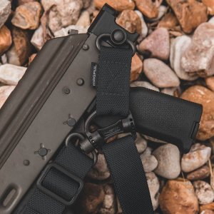 This sling features two heavy-duty push-button QD Sling Swivels along with a custom steel connection ring to allow one to two-point convertibility.